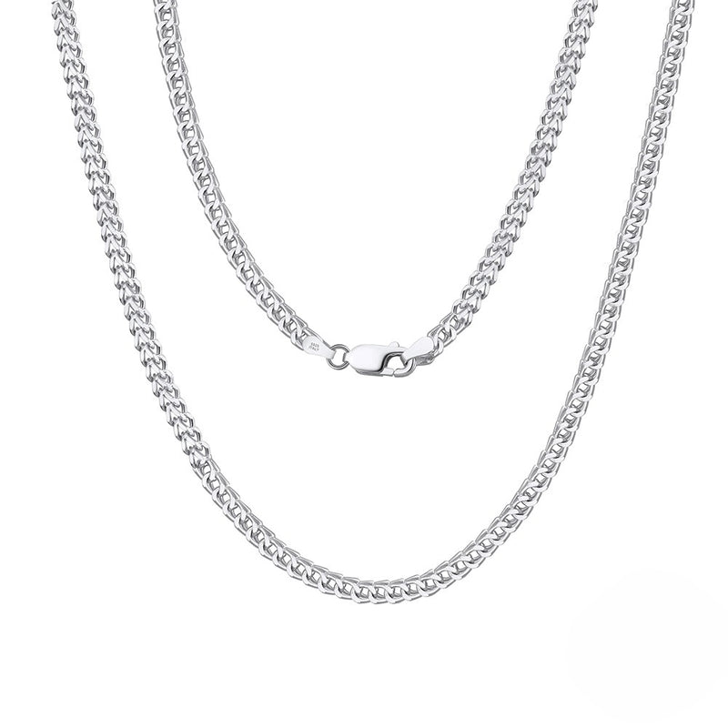 Silver chain necklace on a white background