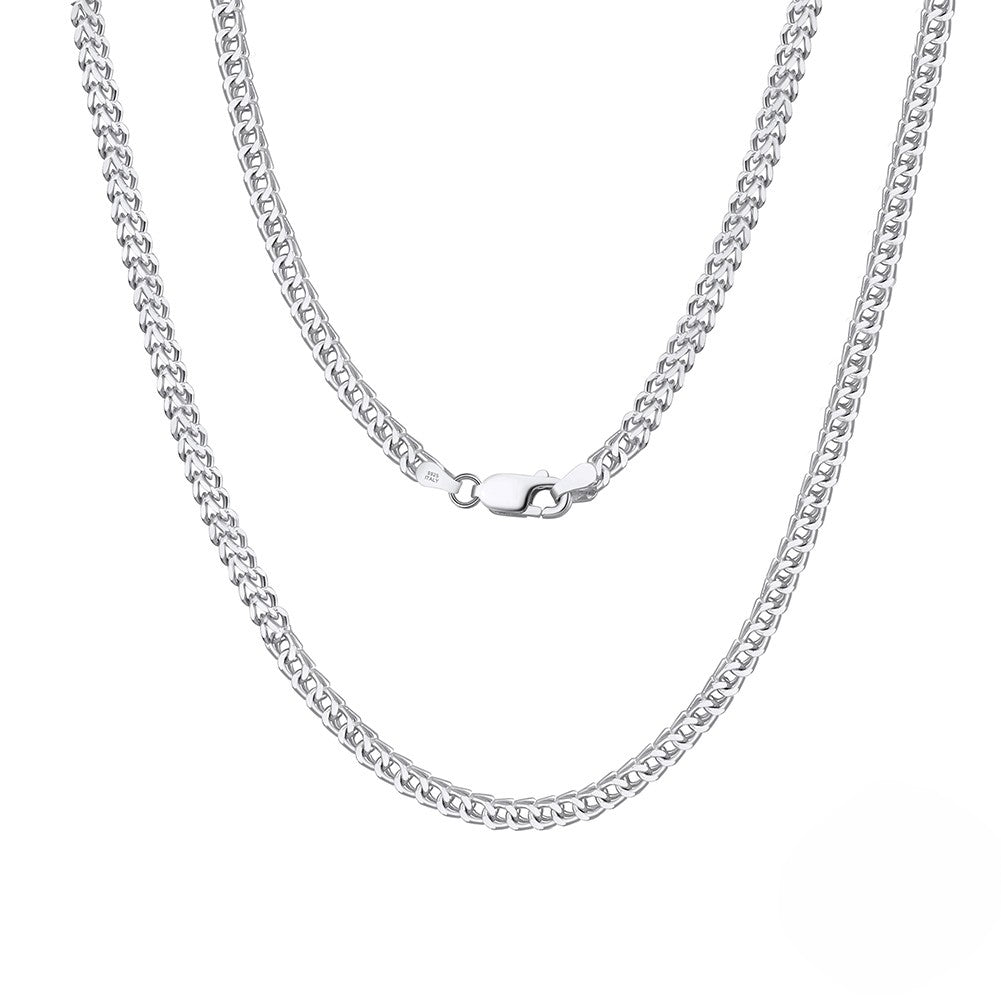 Silver chain necklace on a white background