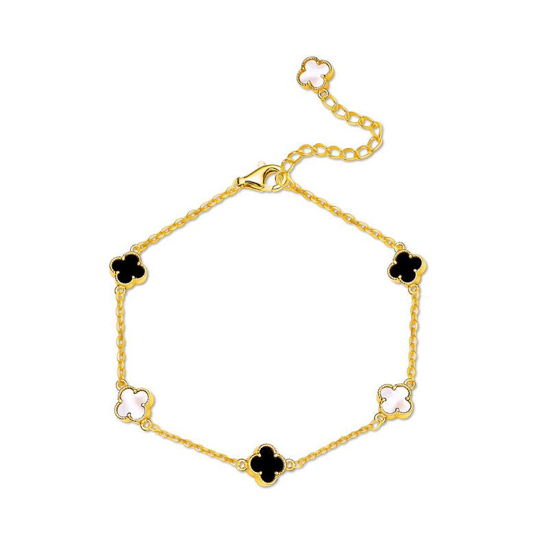 A gold vermeil bracelet featuring clover shaped charms.