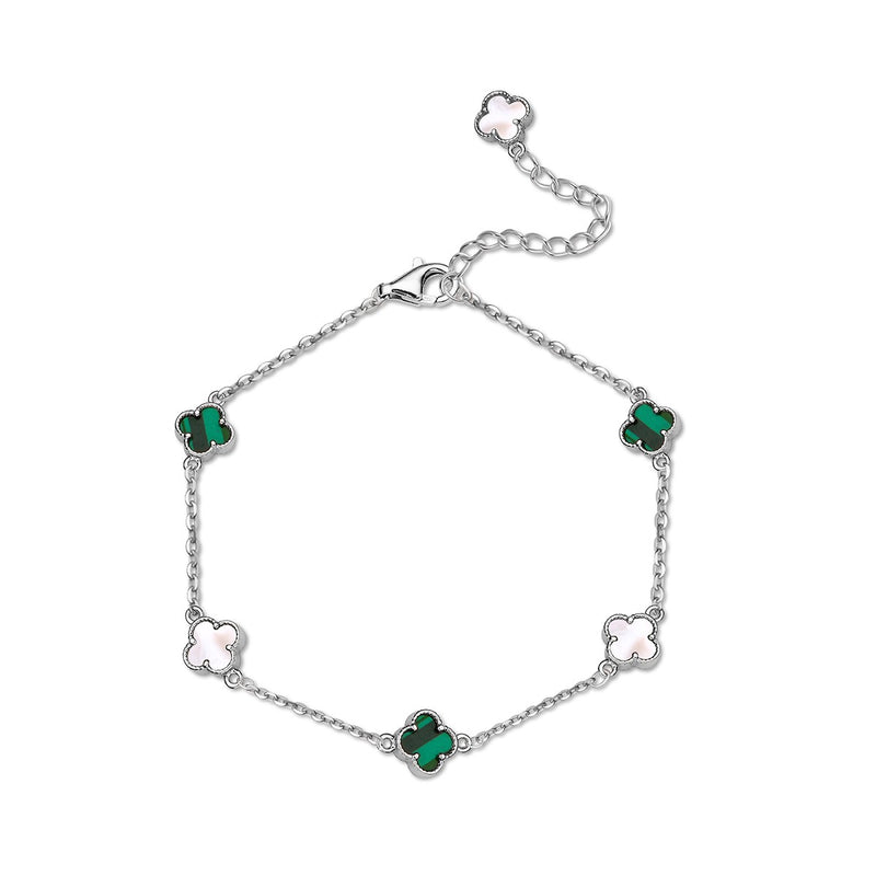 A silver bracelet featuring clover shaped charms