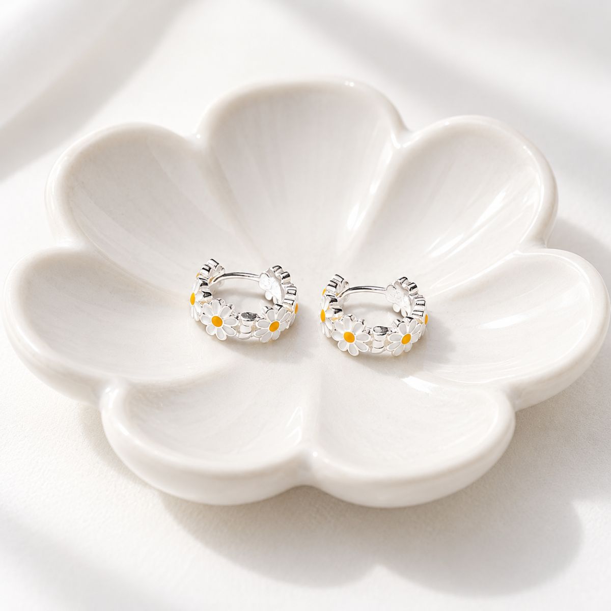 full of daisies on jewellery dish
