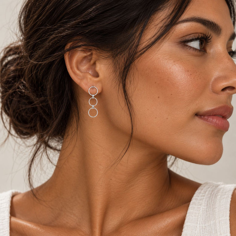 model wearing Elegant Profile with Linked Hoop Earrings