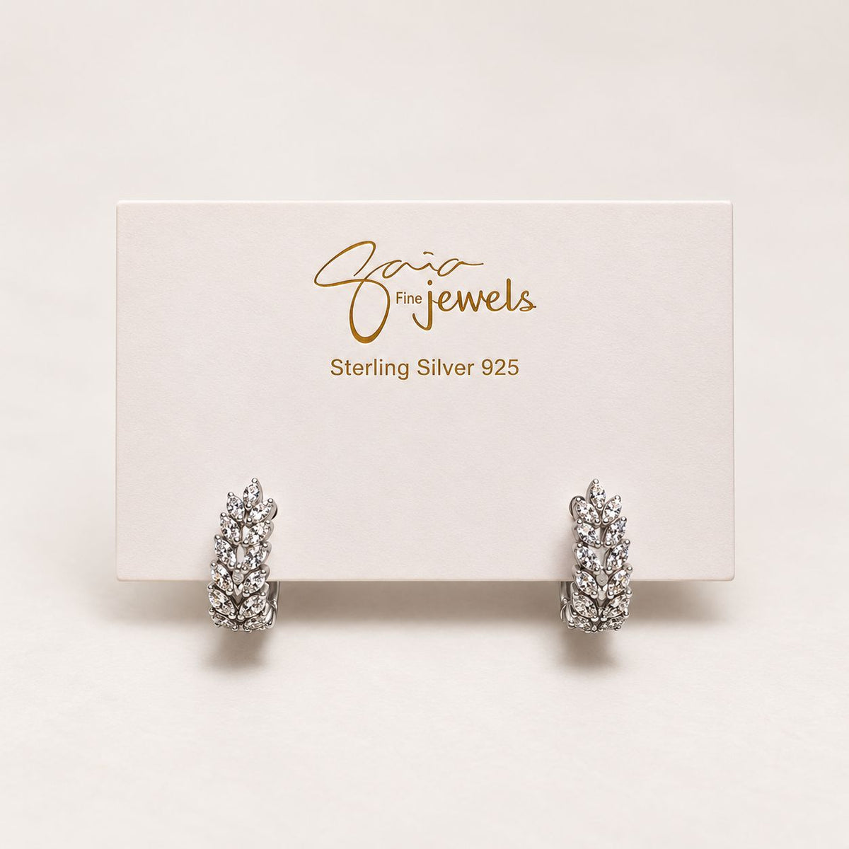 goddess silver huggies on earring card