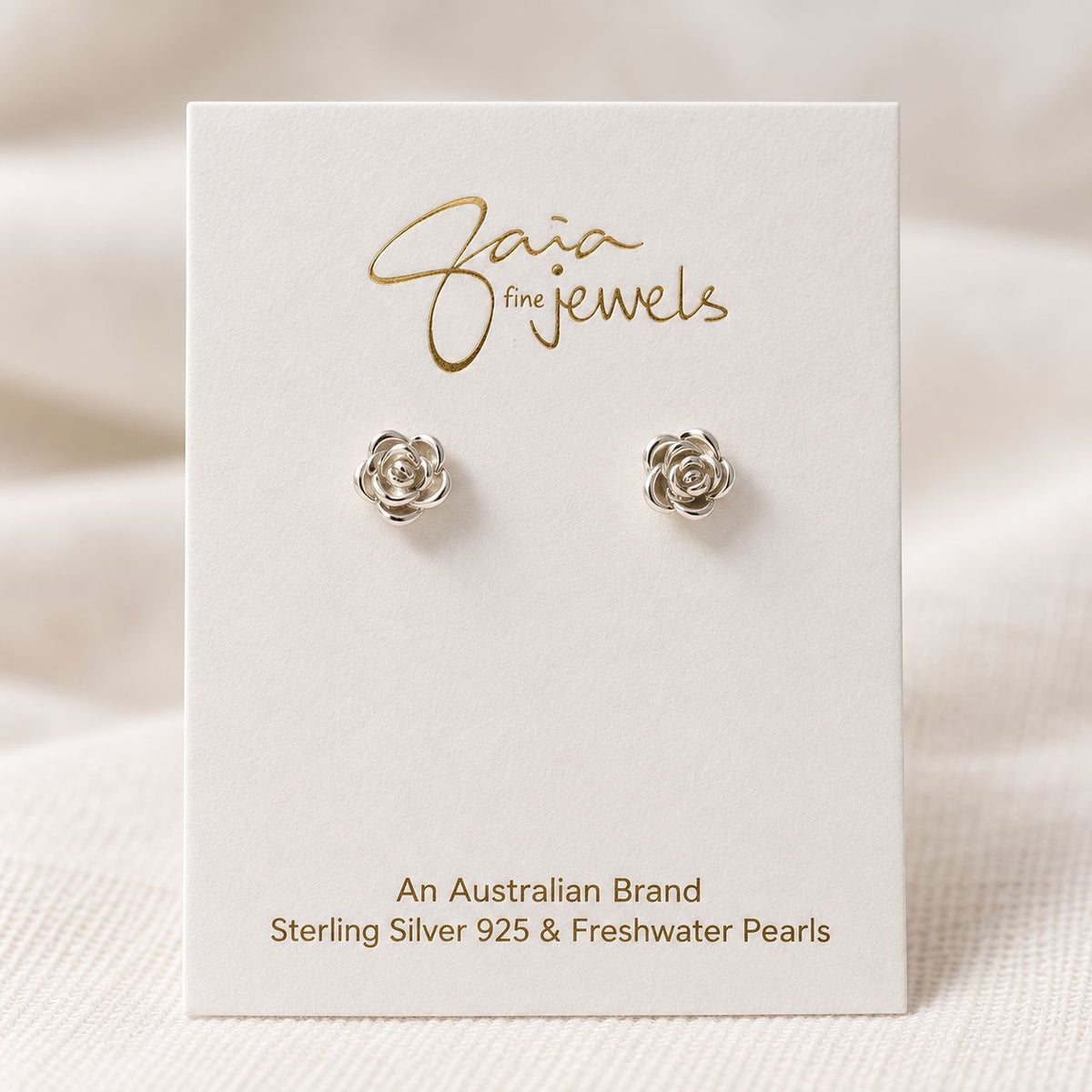 Sterling Silver Rose Flower Earrings on a card