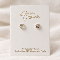 Sterling Silver Rose Flower Earrings on a card