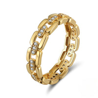 Gold chain-link ring with embedded diamonds CZ on a white background