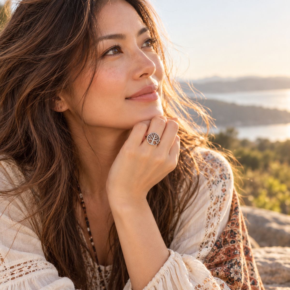 woman wearing tree of life sterling silver ring