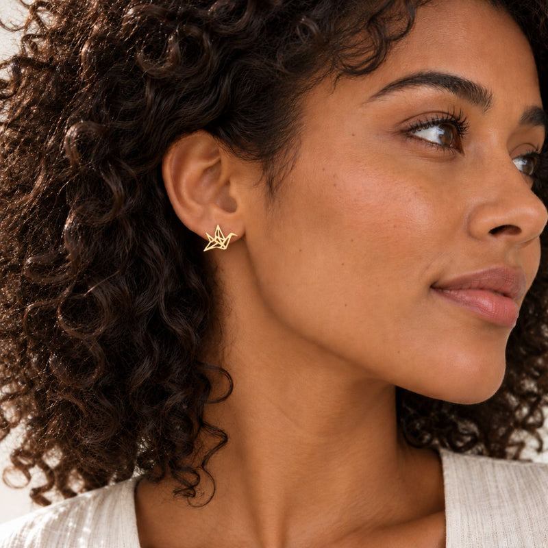 model wearing origami papercrane sterling silver 