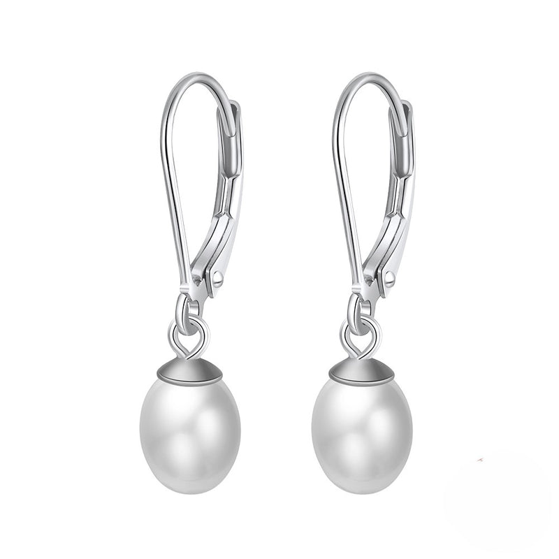 A pair of silver leverback pearl earrings on a white background.