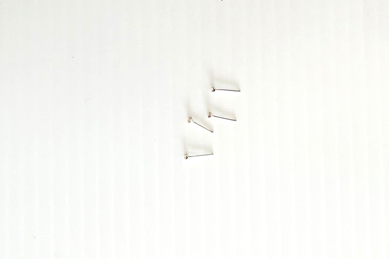 needle nose studs on a white bacground