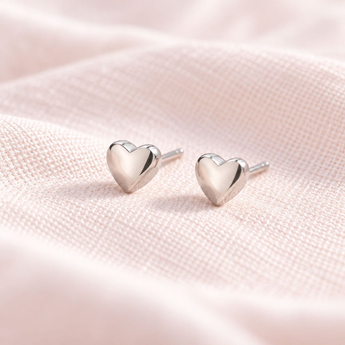 PolishedSilverHeartStudsonBlushLinen