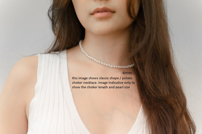 A white 4 mm pearl choker necklace with a sterling silver chain