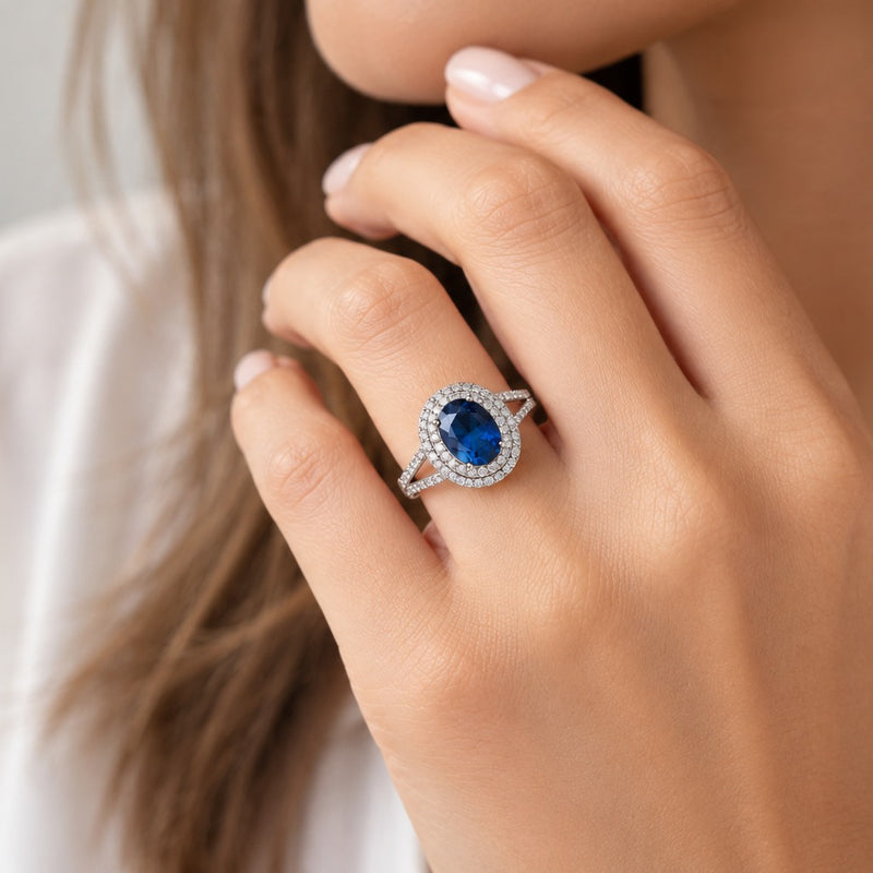 Blue stone ring on a model's finger