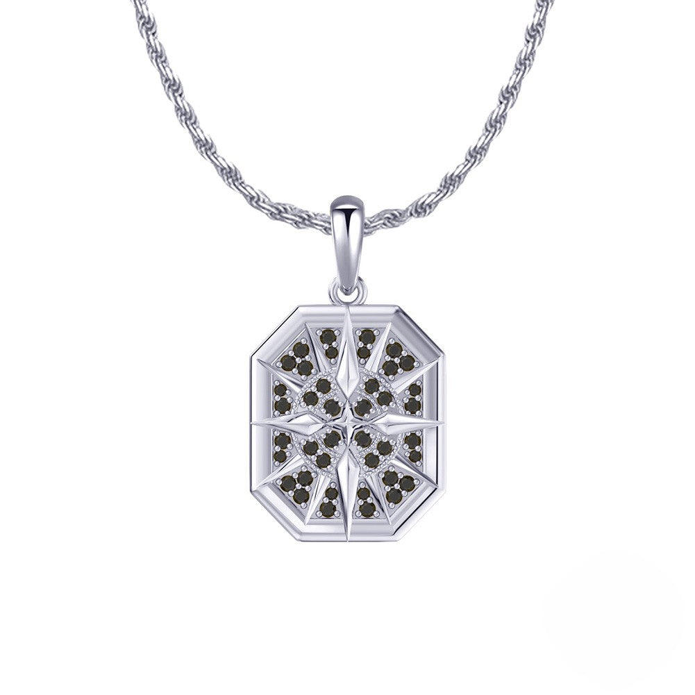 Silver pendant with black stones on a white background