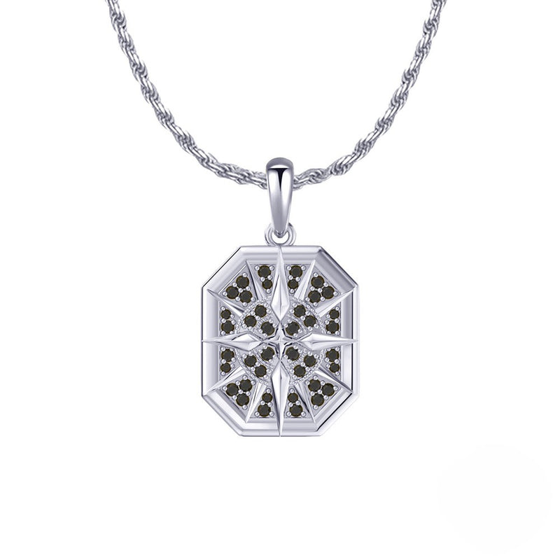 Silver pendant with black stones on a white background