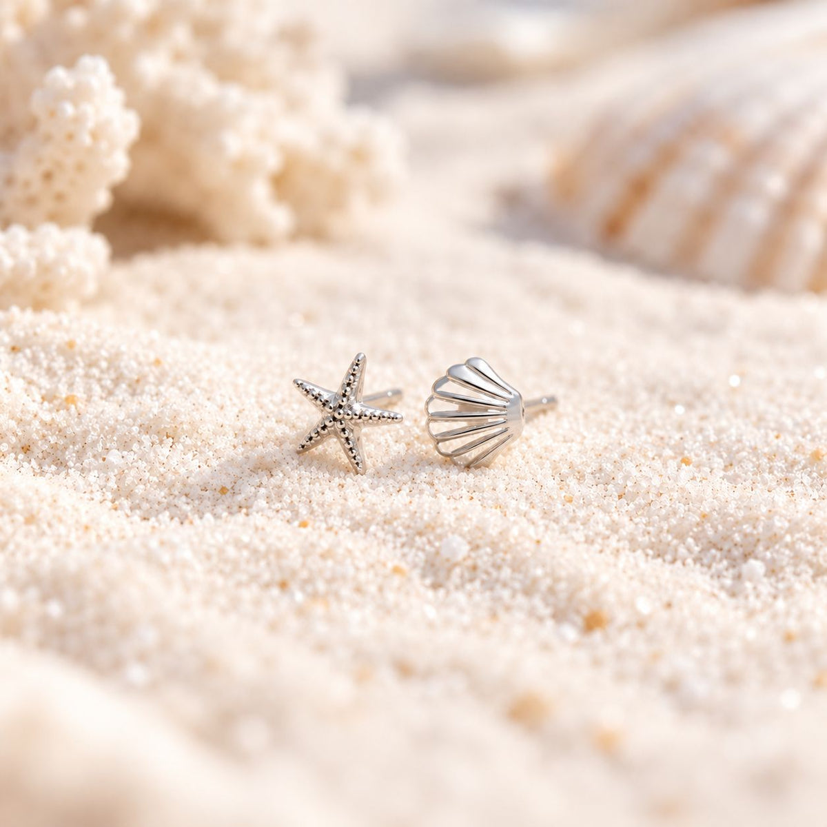 Starfish and Seashell Silver Studs in the sand