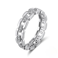 Silver chain-link ring with embedded diamonds CZ on a white background