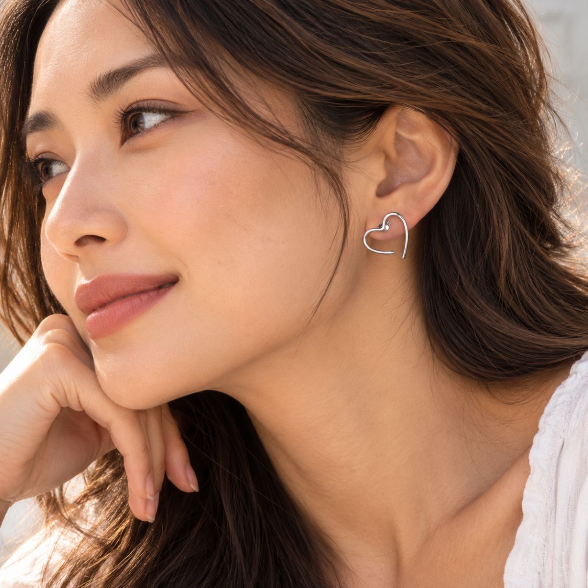 a model wearing sterling silver braveheart earrings