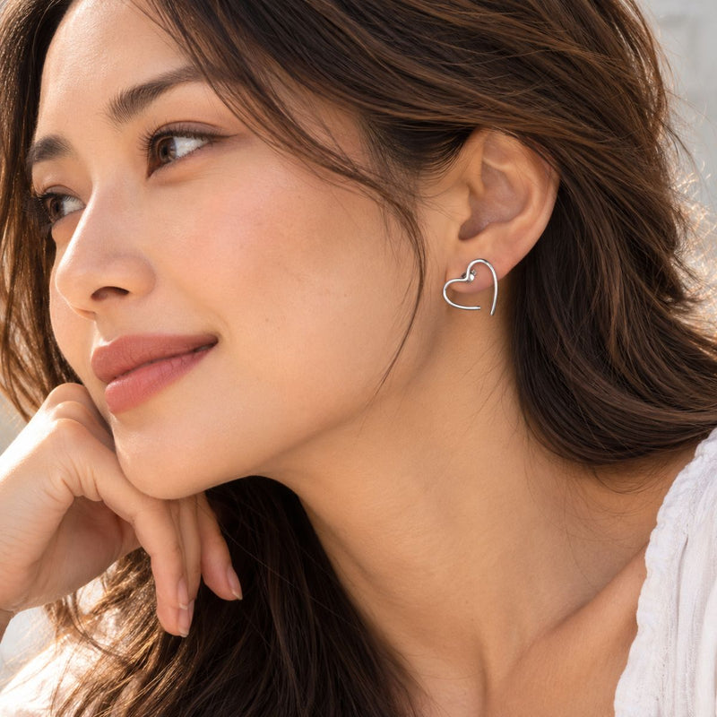 a model wearing sterling silver braveheart earrings