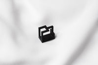 A matte black ring with a minimalist design, 3D printed from sustainable PA12 nylon, displayed on a white background.