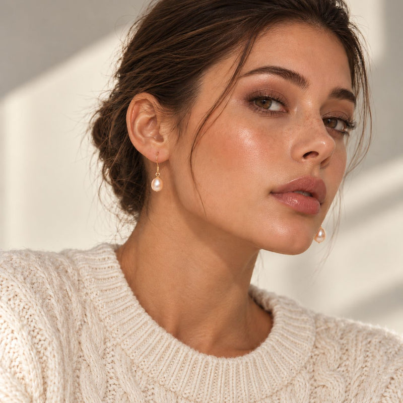 classic hook pearl earrings worn by model