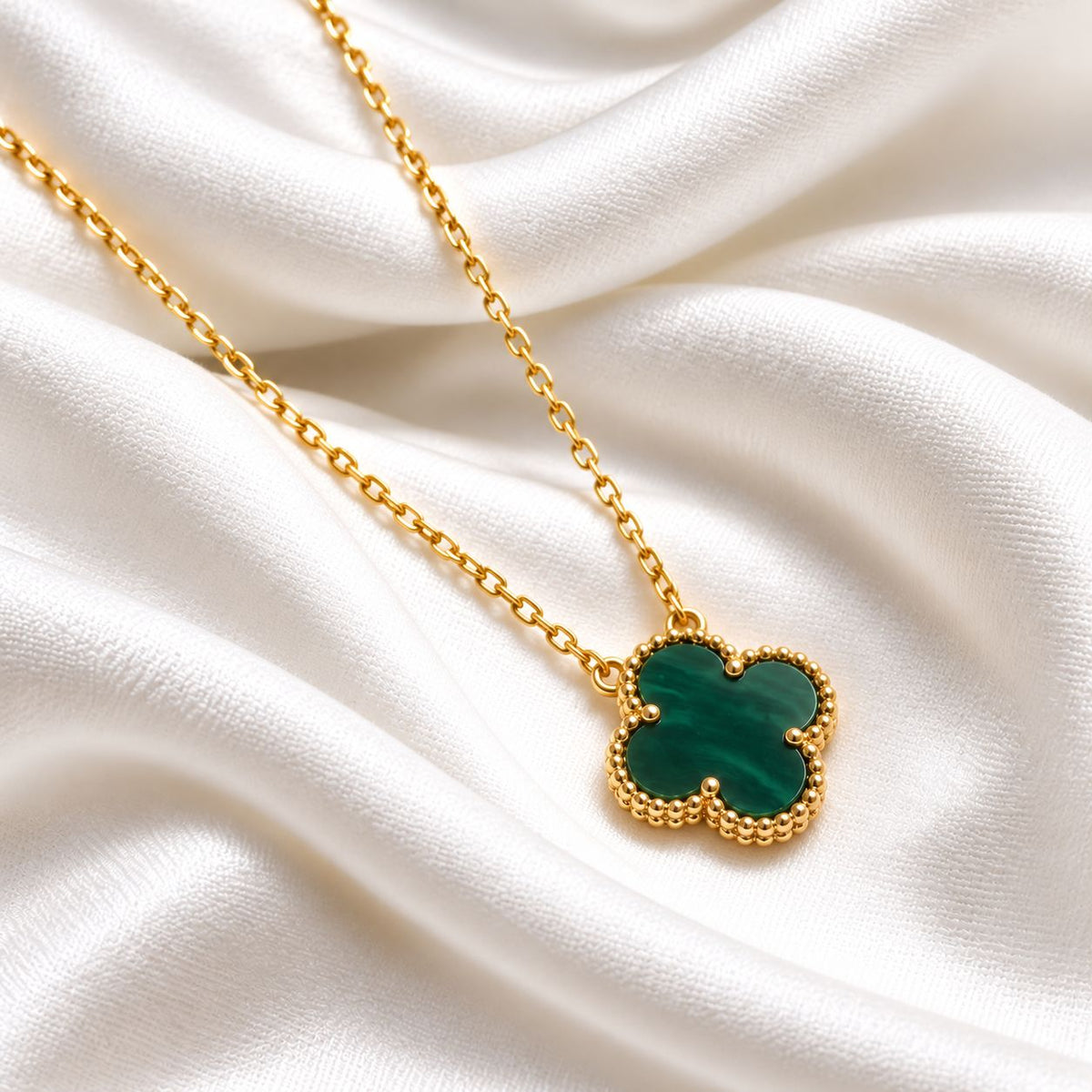 green clover on gold vermeil chain display