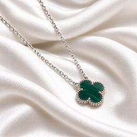 green clover on sterling silver