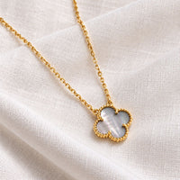 grey mother of pearl on gold