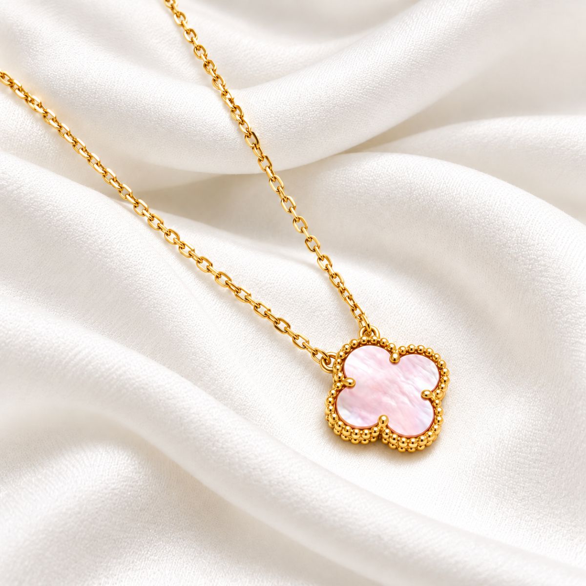 pink clover on gold chain