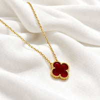 red clover on gold chain