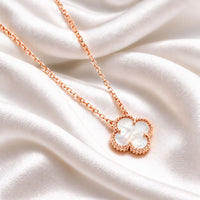 white clover on rose gold 