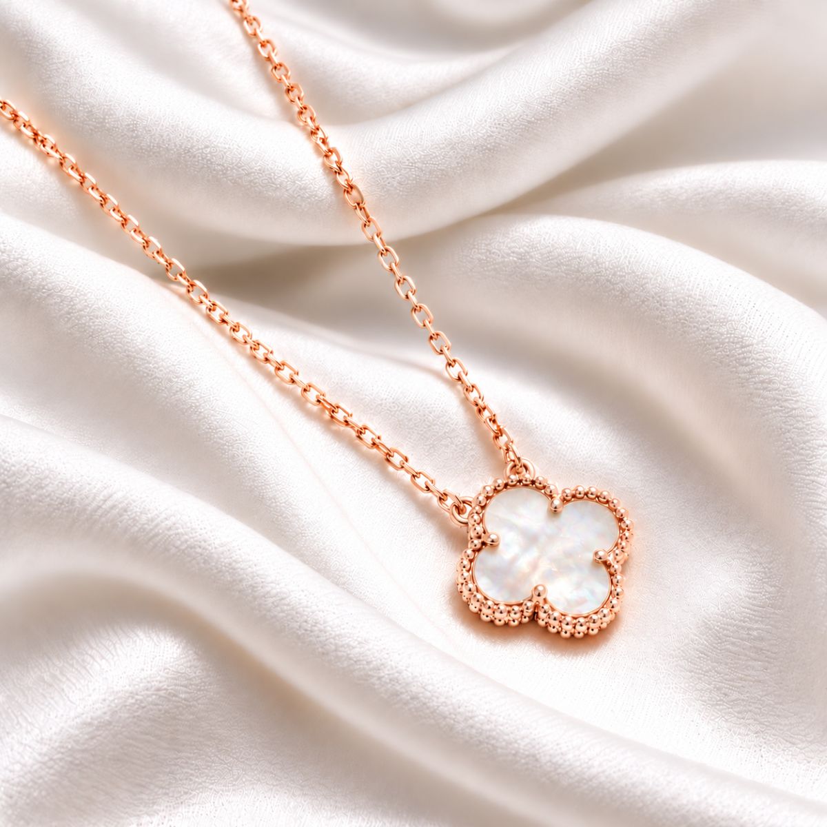 white clover on rose gold 