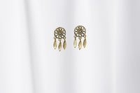 A pair of gold vermeil dreamcatcher stud earrings with butterfly backs, displayed against a white background.