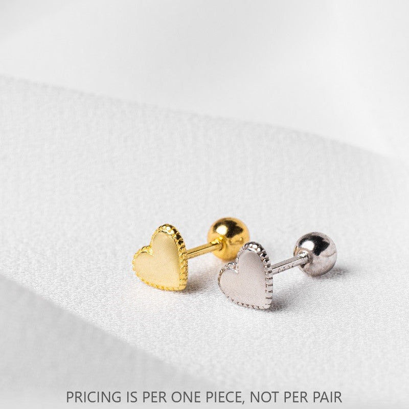 A single heart-shaped piercing with gold vermeil detailing on a white background, with a caption stating 'PRICING IS PER ONE PIECE, NOT PER PAIR'.