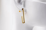 Load image into Gallery viewer, A pair of gold vermeil dangle earrings with a butterfly back design on a white background.
