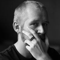 Close up of a man wearing a 3d printed ring